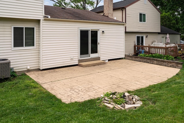 2268 Worthingwoods Blvd, Powell, OH 43065 - back of property featuring roof with shingles, entry steps, a patio, a lawn, and a chimney