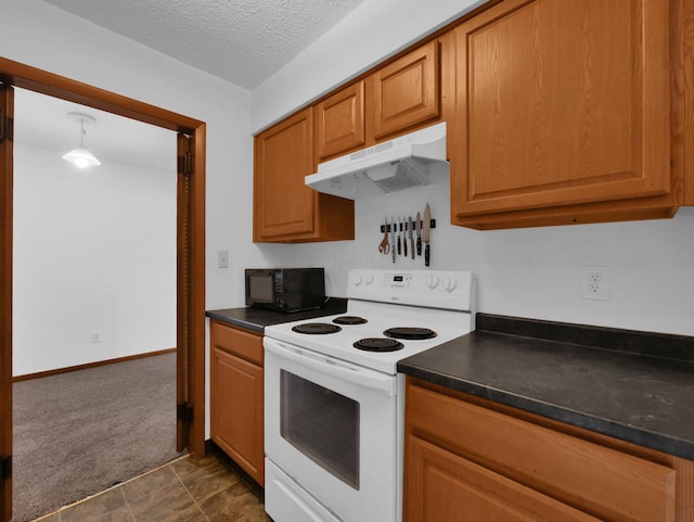 865 Westbury Ln S Unit 12B, Columbus, OH 43228 - kitchen with white range with electric cooktop, under cabinet range hood, black microwave, dark countertops, and a textured ceiling