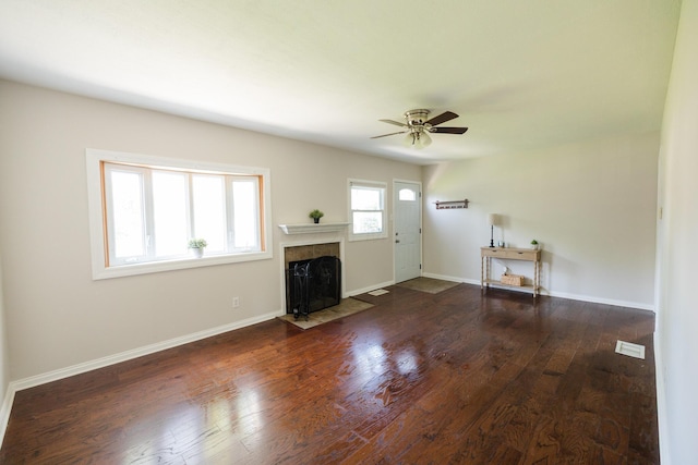 1840 N Columbus St, Lancaster, OH 43130 - unfurnished living room featuring a high end fireplace, a ceiling fan, and wood finished floors