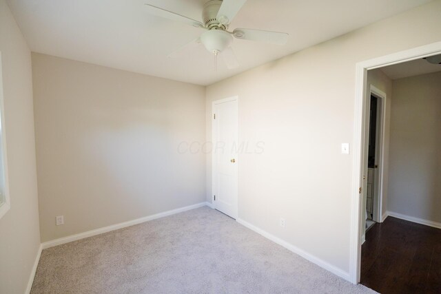 1840 N Columbus St, Lancaster, OH 43130 - empty room featuring ceiling fan and dark carpet