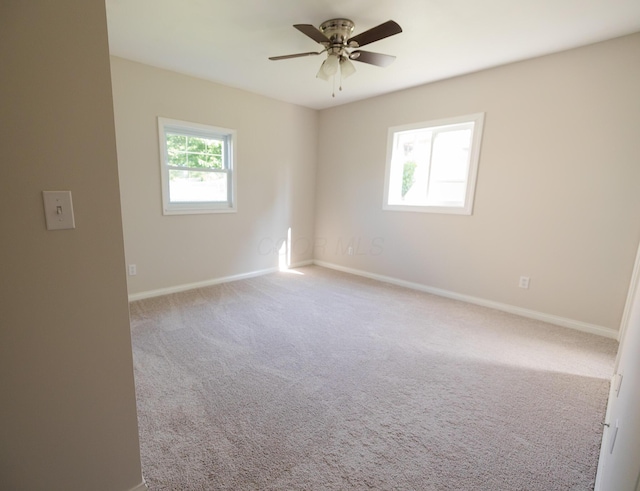 1840 N Columbus St, Lancaster, OH 43130 - carpeted empty room with a ceiling fan and baseboards
