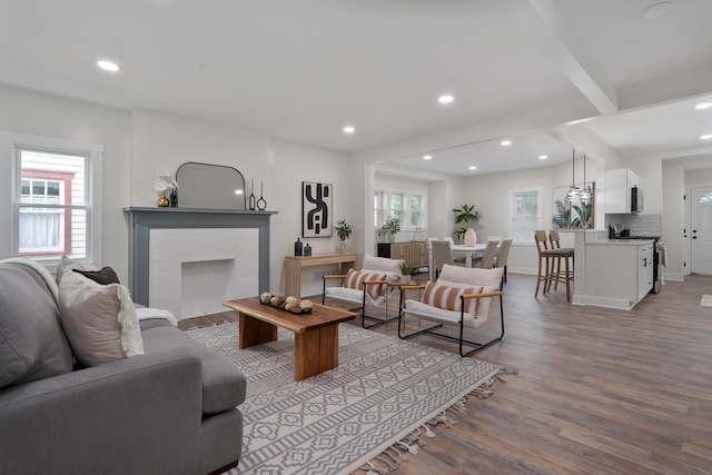 1591 Franklin Ave, Columbus, OH 43205 - living room featuring recessed lighting, wood finished floors, and a fireplace