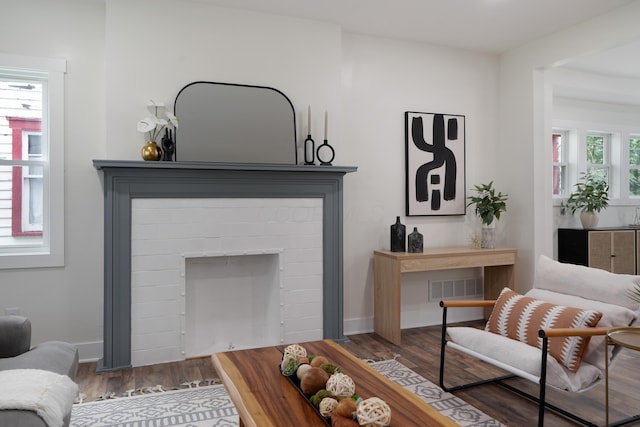 1591 Franklin Ave, Columbus, OH 43205 - living area featuring wood finished floors and a fireplace