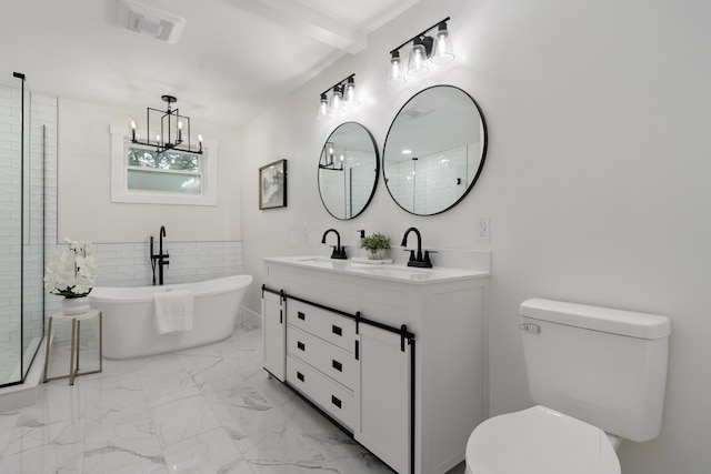 1591 Franklin Ave, Columbus, OH 43205 - bathroom featuring a freestanding bath, double vanity, marble look tile flooring, a chandelier, and beam ceiling