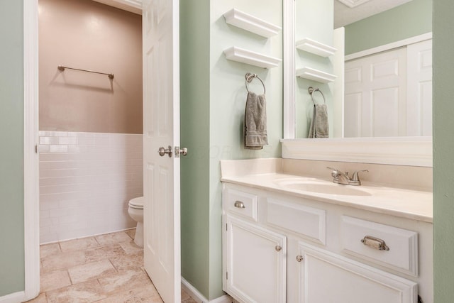 3381 Fishinger Mill Dr, Hilliard, OH 43026 - bathroom featuring vanity and tile walls