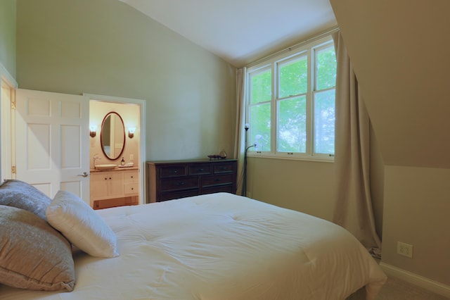 120 Hickory Ln, Lancaster, OH 43130 - bedroom featuring vaulted ceiling, connected bathroom, and carpet