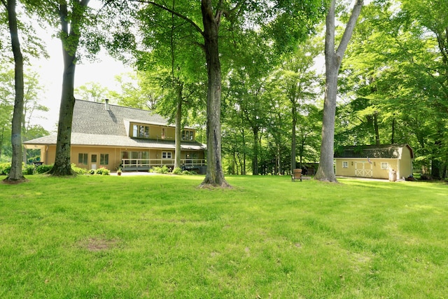 120 Hickory Ln, Lancaster, OH 43130 - view of grassy yard featuring a storage shed