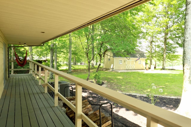 120 Hickory Ln, Lancaster, OH 43130 - deck featuring an outdoor structure and a lawn
