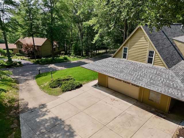 120 Hickory Ln, Lancaster, OH 43130 - view of patio / terrace with driveway and a garage