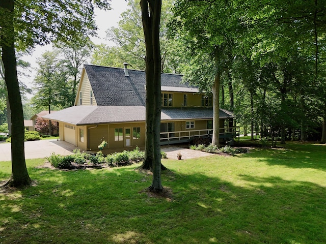 120 Hickory Ln, Lancaster, OH 43130 - view of front of property featuring an attached garage, driveway, a front yard, and a shingled roof