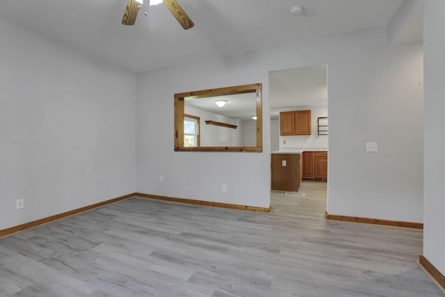 6228 Patton Rd NE, Newark, OH 43055 - empty room with a smoke detector, light wood-style floors, and ceiling fan
