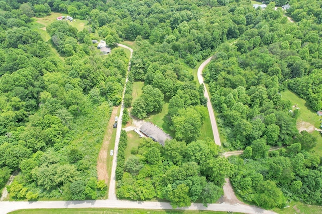 562 Bowman Ln, Chillicothe, OH 45601 - aerial view of property and surrounding area with property parcel outlined and a heavily wooded area