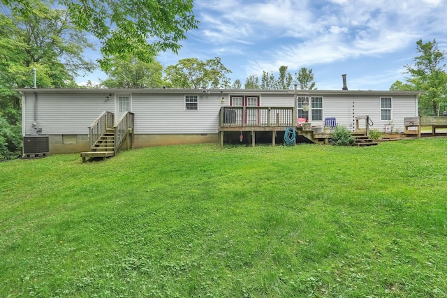 562 Bowman Ln, Chillicothe, OH 45601 - back of house with a lawn, a deck, and crawl space