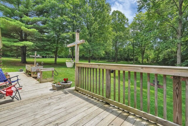 562 Bowman Ln, Chillicothe, OH 45601 - wooden deck with a yard and view of wooded area