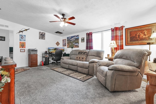 562 Bowman Ln, Chillicothe, OH 45601 - carpeted living area featuring a desk, a ceiling fan, a textured ceiling, and lofted ceiling