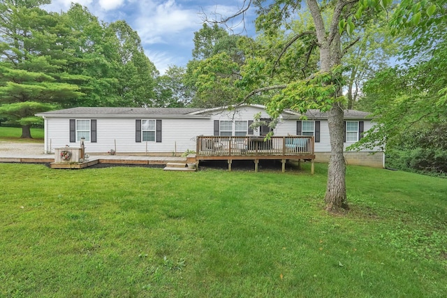 562 Bowman Ln, Chillicothe, OH 45601 - rear view of property featuring a deck and a yard