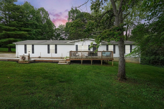 562 Bowman Ln, Chillicothe, OH 45601 - back of property featuring a wooden deck and a yard