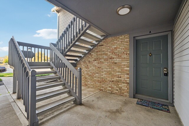 2082 Park Run Dr Unit A, Columbus, OH 43220 - property entrance featuring brick siding