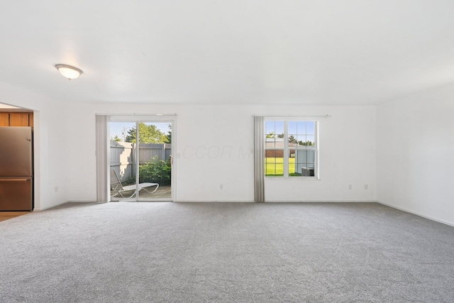 2082 Park Run Dr Unit A, Columbus, OH 43220 - carpeted empty room with plenty of natural light
