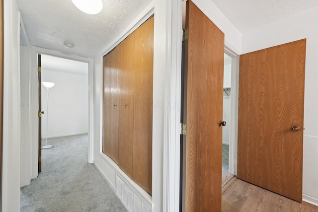 2082 Park Run Dr Unit A, Columbus, OH 43220 - hallway with a textured ceiling