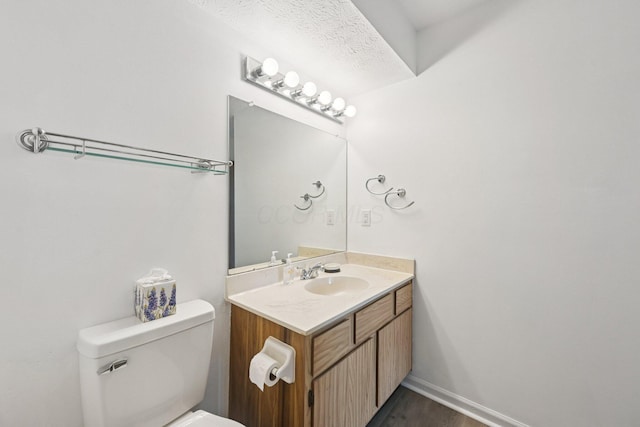 2082 Park Run Dr Unit A, Columbus, OH 43220 - half bathroom featuring vanity and wood finished floors