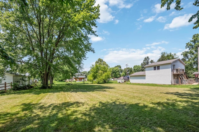 247 3rd St, La Rue, OH 43332 - view of yard featuring a deck