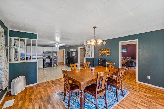 247 3rd St, La Rue, OH 43332 - dining space with light wood-type flooring and a ceiling fan