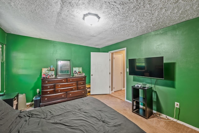 247 3rd St, La Rue, OH 43332 - carpeted bedroom with a textured ceiling