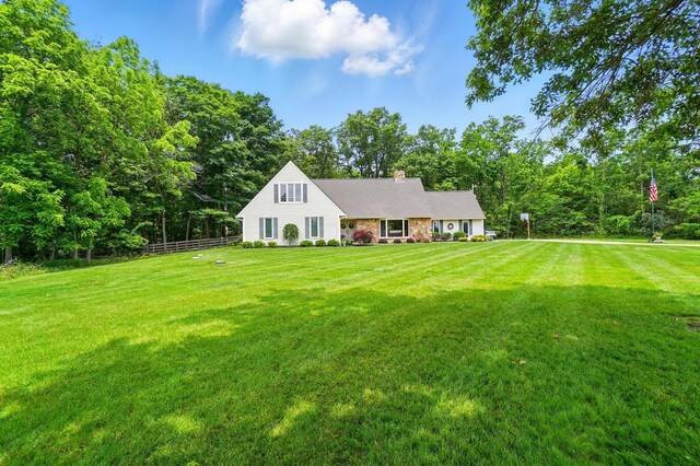 8384 Morris Rd, Hilliard, OH 43026 - view of front of house with a chimney and stone siding