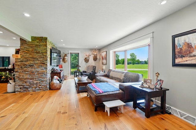 8384 Morris Rd, Hilliard, OH 43026 - living room with wood-type flooring and recessed lighting