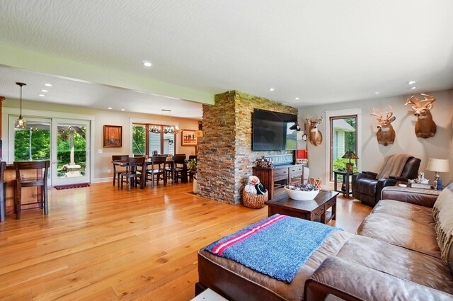 8384 Morris Rd, Hilliard, OH 43026 - living area featuring light wood-style floors, a chandelier, plenty of natural light, and recessed lighting