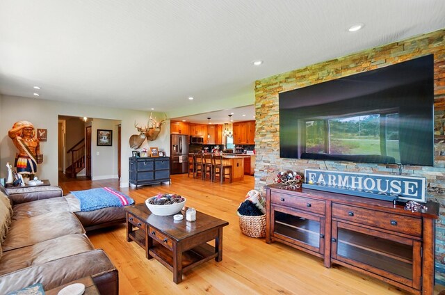 8384 Morris Rd, Hilliard, OH 43026 - living area with stairway, light wood-type flooring, and recessed lighting