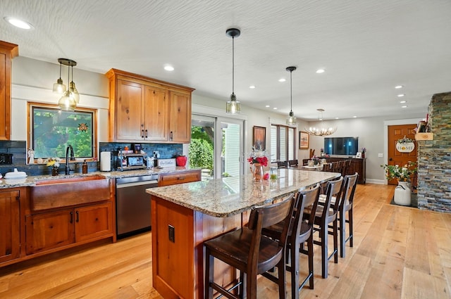 8384 Morris Rd, Hilliard, OH 43026 - kitchen featuring dishwasher, light wood finished floors, tasteful backsplash, and recessed lighting