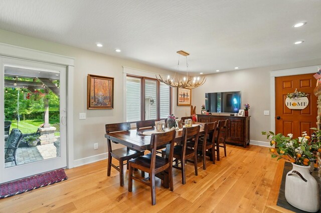 8384 Morris Rd, Hilliard, OH 43026 - dining space with a chandelier, light wood-style floors, and recessed lighting