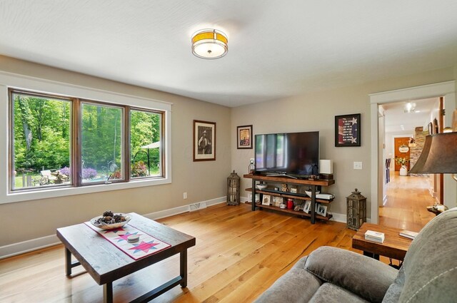 8384 Morris Rd, Hilliard, OH 43026 - living area featuring plenty of natural light and light wood finished floors