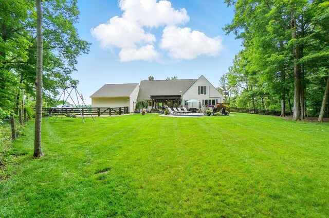 8384 Morris Rd, Hilliard, OH 43026 - back of house with a patio area and a chimney