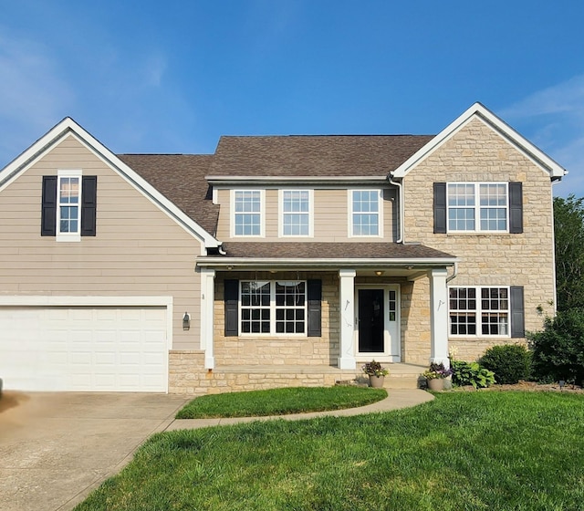 2467 Roe Dr, Lewis Center, OH 43035 - traditional home featuring stone siding, roof with shingles, and driveway