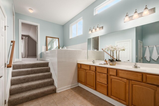 2467 Roe Dr, Lewis Center, OH 43035 - bathroom featuring double vanity and tile patterned flooring
