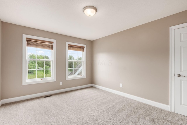 2467 Roe Dr, Lewis Center, OH 43035 - spare room with baseboards and carpet floors
