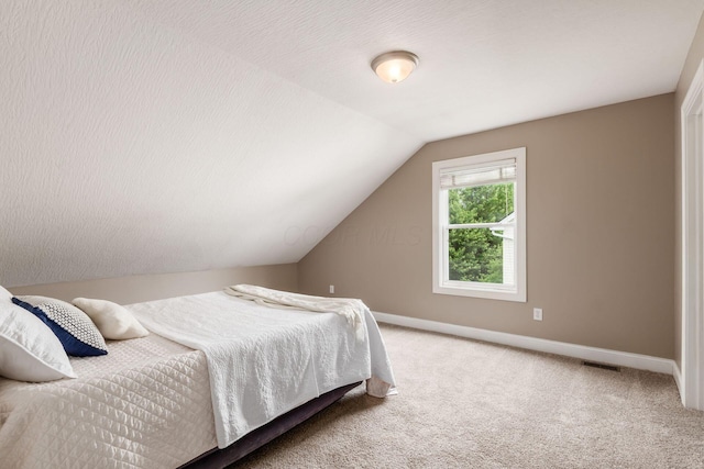 2467 Roe Dr, Lewis Center, OH 43035 - bedroom featuring carpet and lofted ceiling