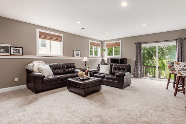 2467 Roe Dr, Lewis Center, OH 43035 - living area with carpet, plenty of natural light, and recessed lighting