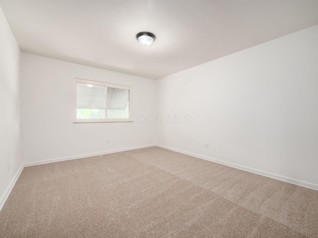 6509 Evening St, Worthington, OH 43085 - empty room featuring baseboards and carpet flooring
