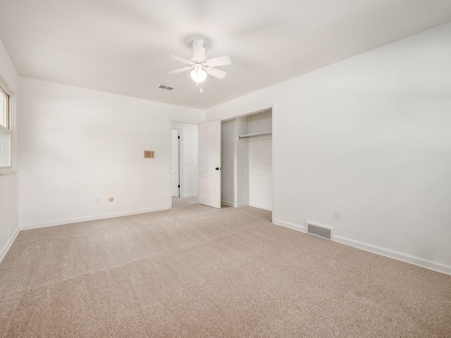 6509 Evening St, Worthington, OH 43085 - unfurnished bedroom with light colored carpet, a closet, and ceiling fan