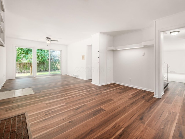 6509 Evening St, Worthington, OH 43085 - unfurnished living room featuring dark wood finished floors and ceiling fan