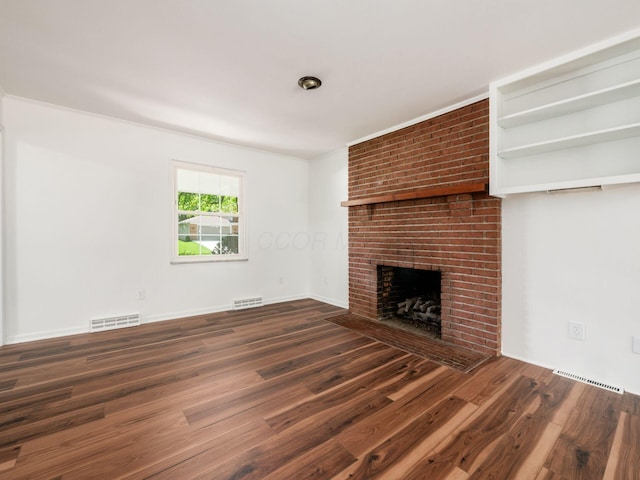 6509 Evening St, Worthington, OH 43085 - unfurnished living room with a fireplace and wood finished floors