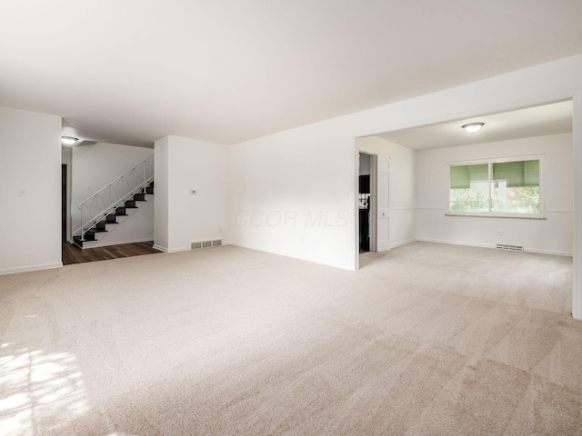 6509 Evening St, Worthington, OH 43085 - empty room with carpet and stairs