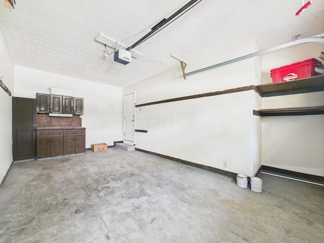 6343 Birchview Dr S Unit 6343-6345, Reynoldsburg, OH 43068 - garage with a garage door opener