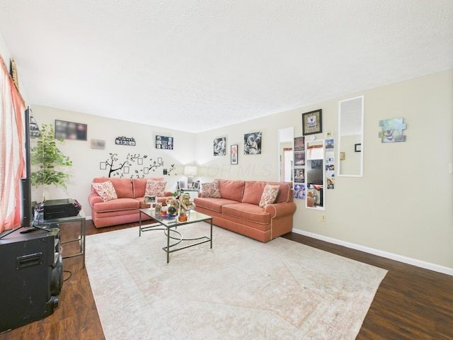 6343 Birchview Dr S Unit 6343-6345, Reynoldsburg, OH 43068 - living area featuring dark wood-style flooring and baseboards