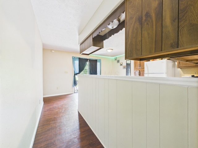 6343 Birchview Dr S Unit 6343-6345, Reynoldsburg, OH 43068 - hall featuring baseboards and dark wood finished floors