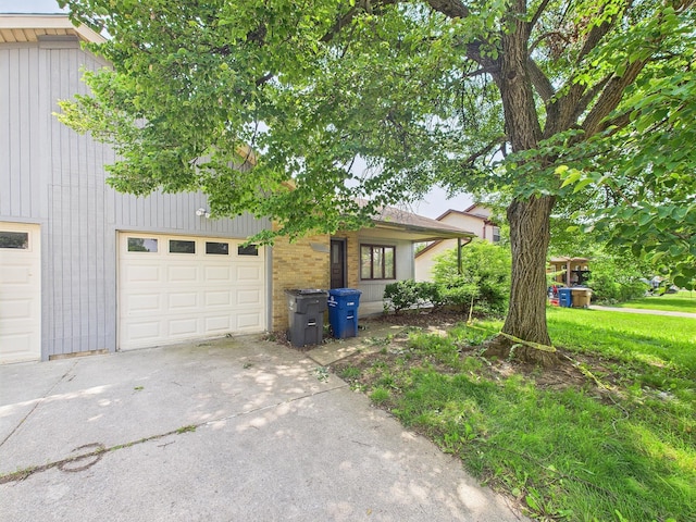 6343 Birchview Dr S Unit 6343-6345, Reynoldsburg, OH 43068 - view of front of property with a garage and driveway